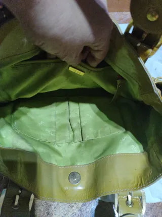 Bolso Tous amarillo con tachuelas