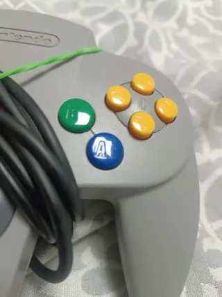 Nintendo 64 Mando + Super Smash Bros