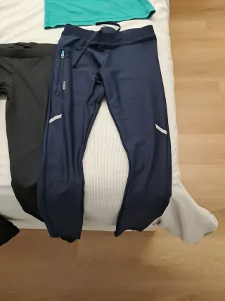 Ropa de vela rosa, negra y verde.