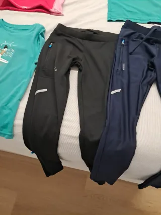 Ropa de vela rosa, negra y verde.