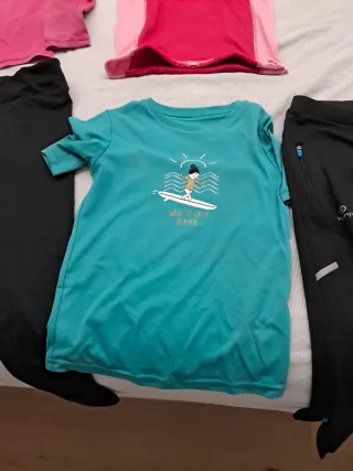 Ropa de vela rosa, negra y verde.