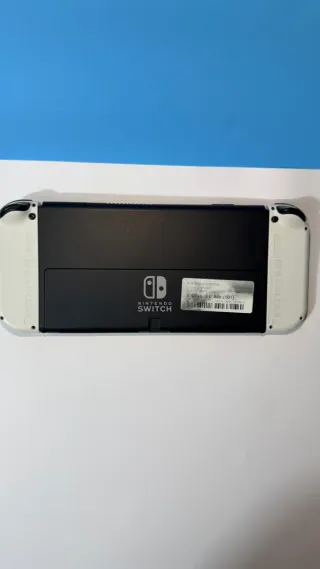 Nintendo Switch OLED + Funda y audífonos