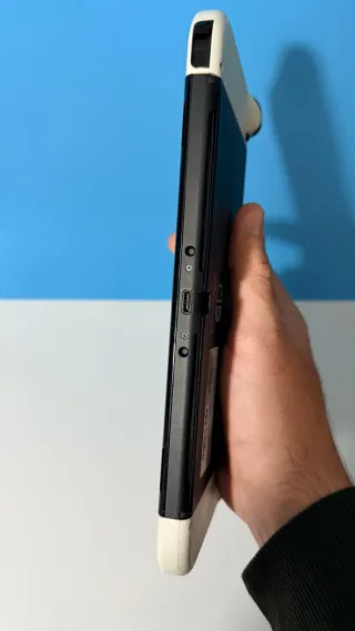 Nintendo Switch OLED + Funda y audífonos