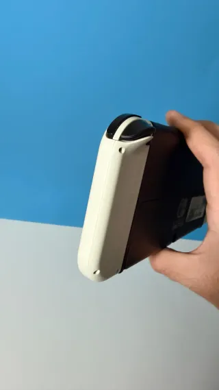 Nintendo Switch OLED + Funda y audífonos