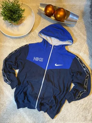 Sudadera Nike con cremallera azul y negra