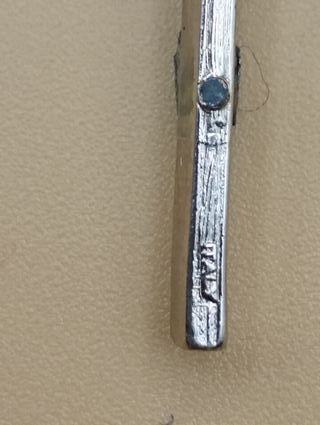 Colgante de Cristo plateado