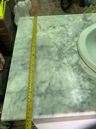 Mueble de baño con encimera de mármol