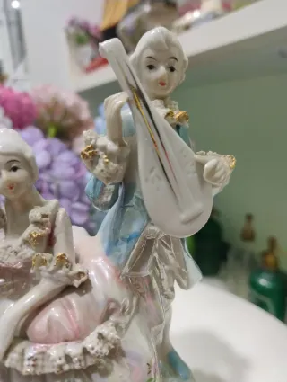Figura porcelana alemana pareja música 70s