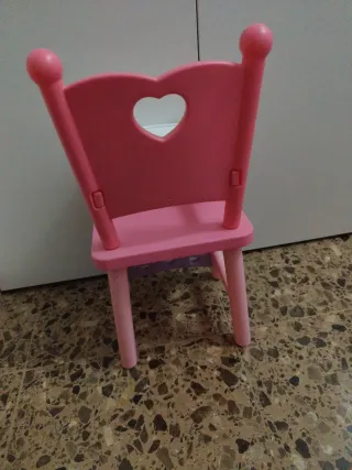 Trona de juguete rosa