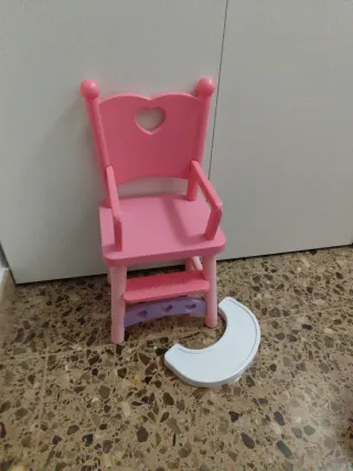 Trona de juguete rosa