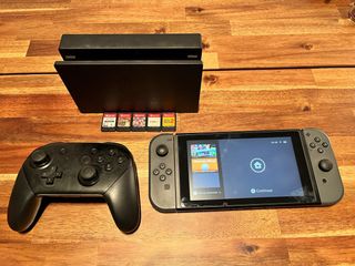 Nintendo Switch + 5 juegos + Mando Pro + funda