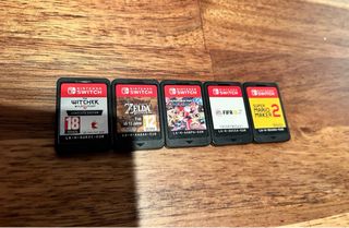 Nintendo Switch + 5 juegos + Mando Pro + funda