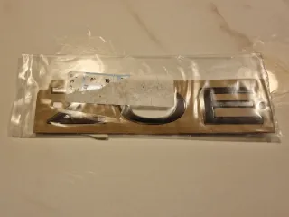 Insignia Emblema ZOE