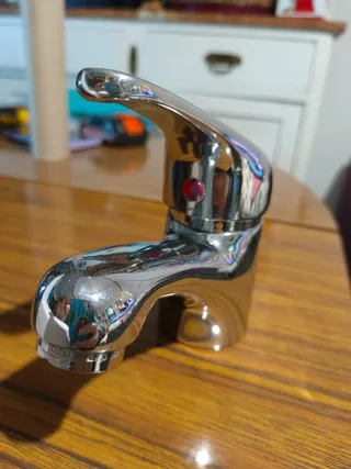 Grifo de lavabo con manguitos