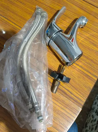 Grifo de lavabo con manguitos