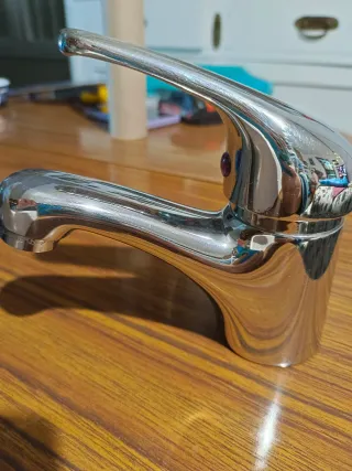 Grifo de lavabo con manguitos