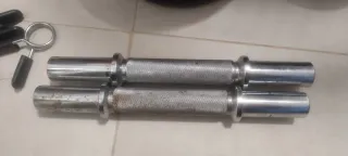 Mancuernas con discos y cierres.