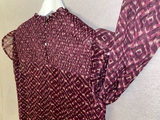 Blusa Noon color cereza .