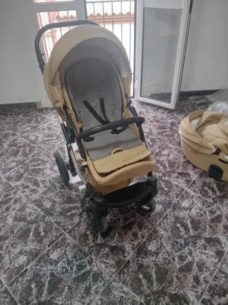 Carro de bebé color beige