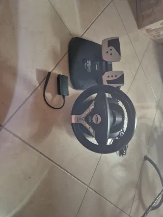 PS2 + 2 Joypad + 4 Giochi+sterzo e pedaliera