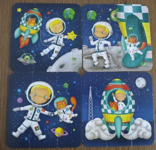 Puzzle evolutivo espacial niño y gato. 4 puzzles