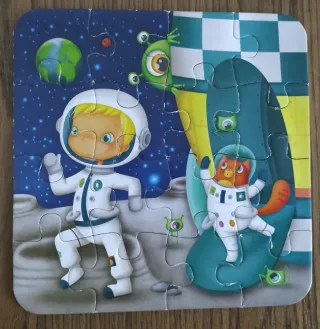 Puzzle evolutivo espacial niño y gato. 4 puzzles