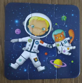 Puzzle evolutivo espacial niño y gato. 4 puzzles