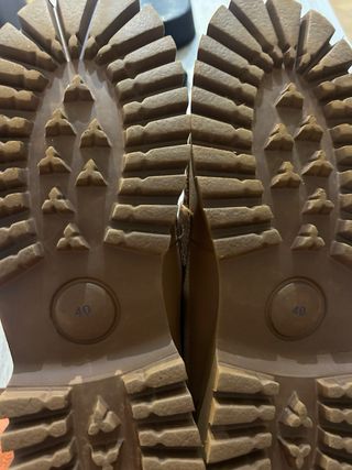 Mocasines de piel Carmela con cadena dorada