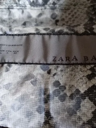 Chubasquero estampado serpiente