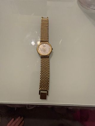 Reloj Lotus Dorado y Blanco