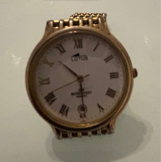 Reloj Lotus Dorado y Blanco