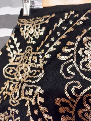 Minifalda fiesta lentejuelas Stradivarius T.36