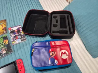 Nintendo Switch + 8 Juegos, 2 maletines, cascos