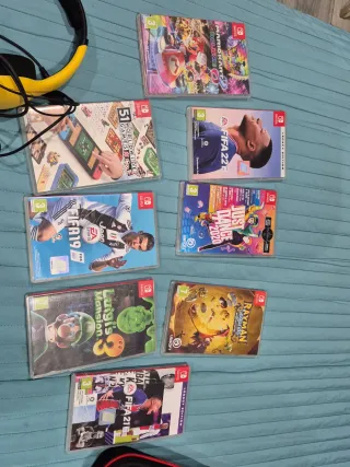 Nintendo Switch + 8 Juegos, 2 maletines, cascos