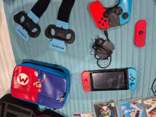 Nintendo Switch + 8 Juegos, 2 maletines, cascos