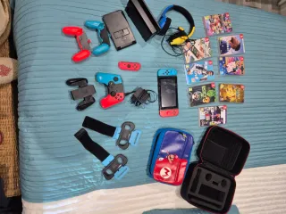 Nintendo Switch + 8 Juegos, 2 maletines, cascos