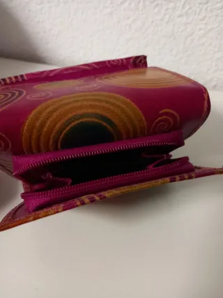 Monedero étnico de piel. Hecho a mano