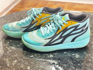 Zapatillas Baloncesto Puma Melo Doradas/Turquesa