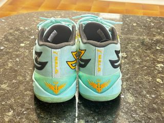 Zapatillas Baloncesto Puma Melo Doradas/Turquesa