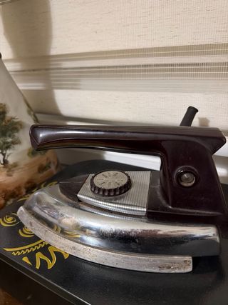 Plancha antigua de baquelita y cromo