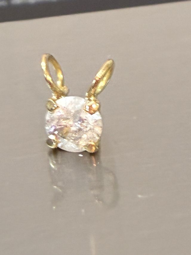 Colgante Oro 18k con 0.90 Ct Diamante Natural