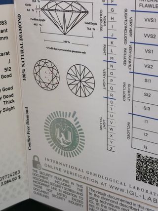 Colgante Oro 18k con 0.90 Ct Diamante Natural