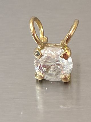Colgante Oro 18k con 0.90 Ct Diamante Natural