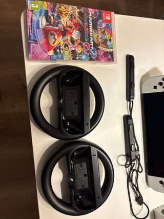 Nintendo Switch OLED + 4 Giochi + Controller Pro