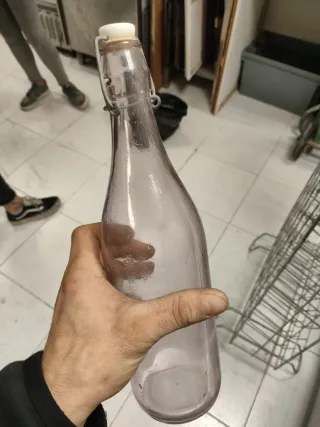 29 bottiglie antiche + espositore