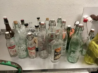 29 bottiglie antiche + espositore