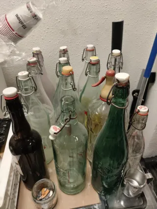 29 bottiglie antiche + espositore