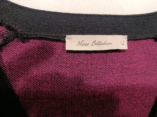 Chaqueta negra y fucsia con botones joya