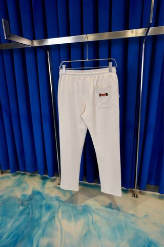 Pantalón Hermes verde con cordón naranja