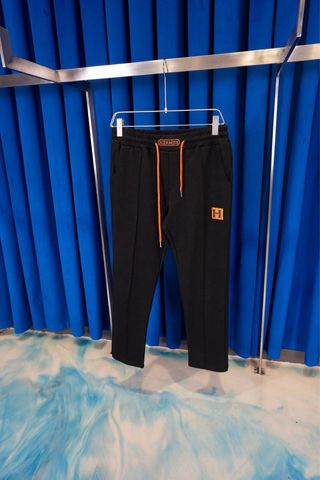 Pantalón Hermes verde con cordón naranja